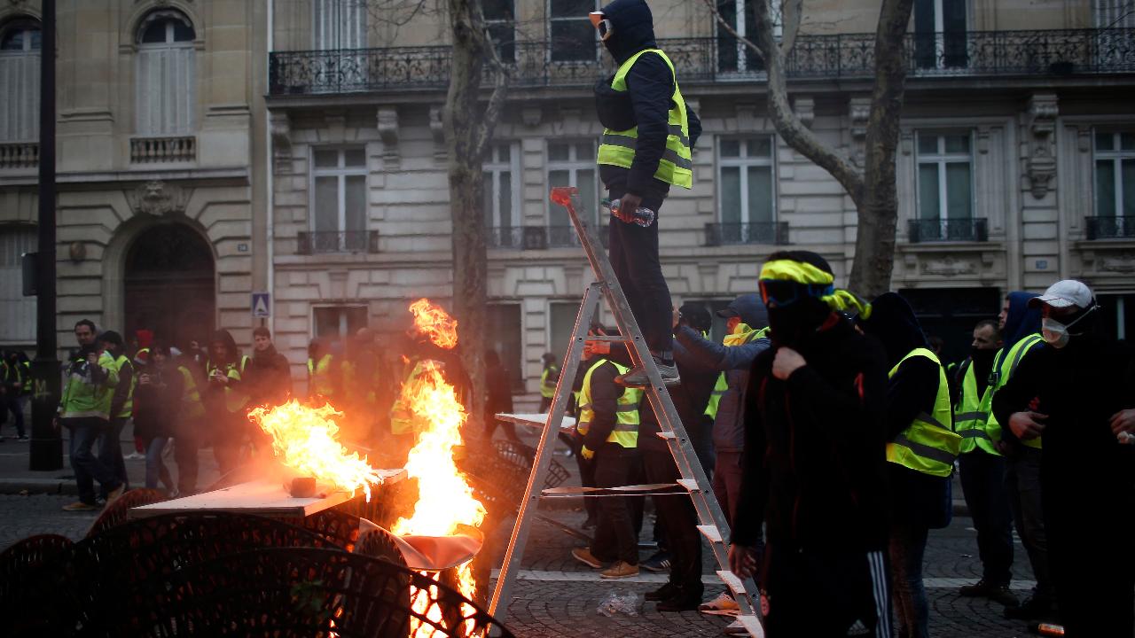 Macron abandons fuel tax amid violent protests