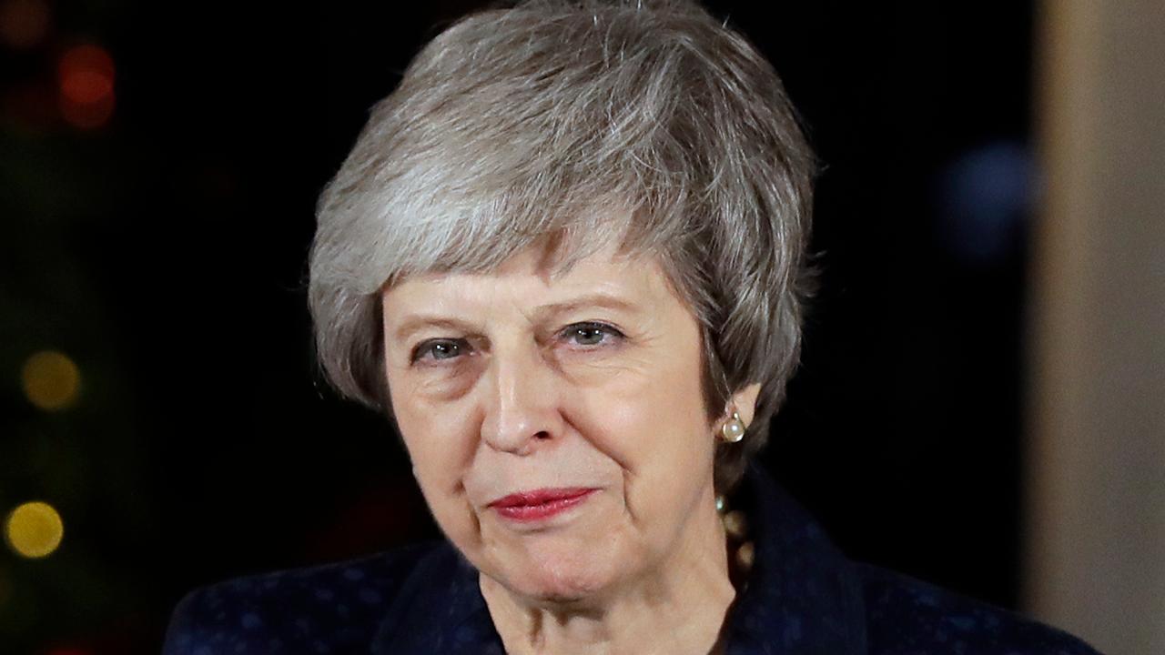 Theresa May survives no-confidence vote