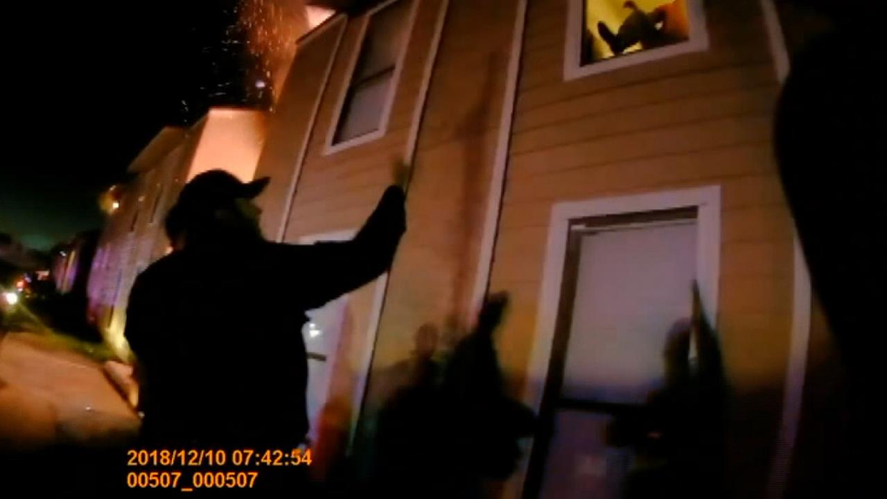 Officers rescue boy trapped in burning apartment
