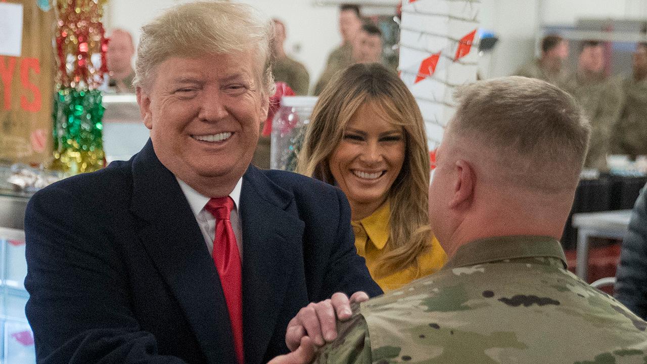 President Trump's unannounced visit to US troops in Iraq: A look at the political implications both at home and overseas