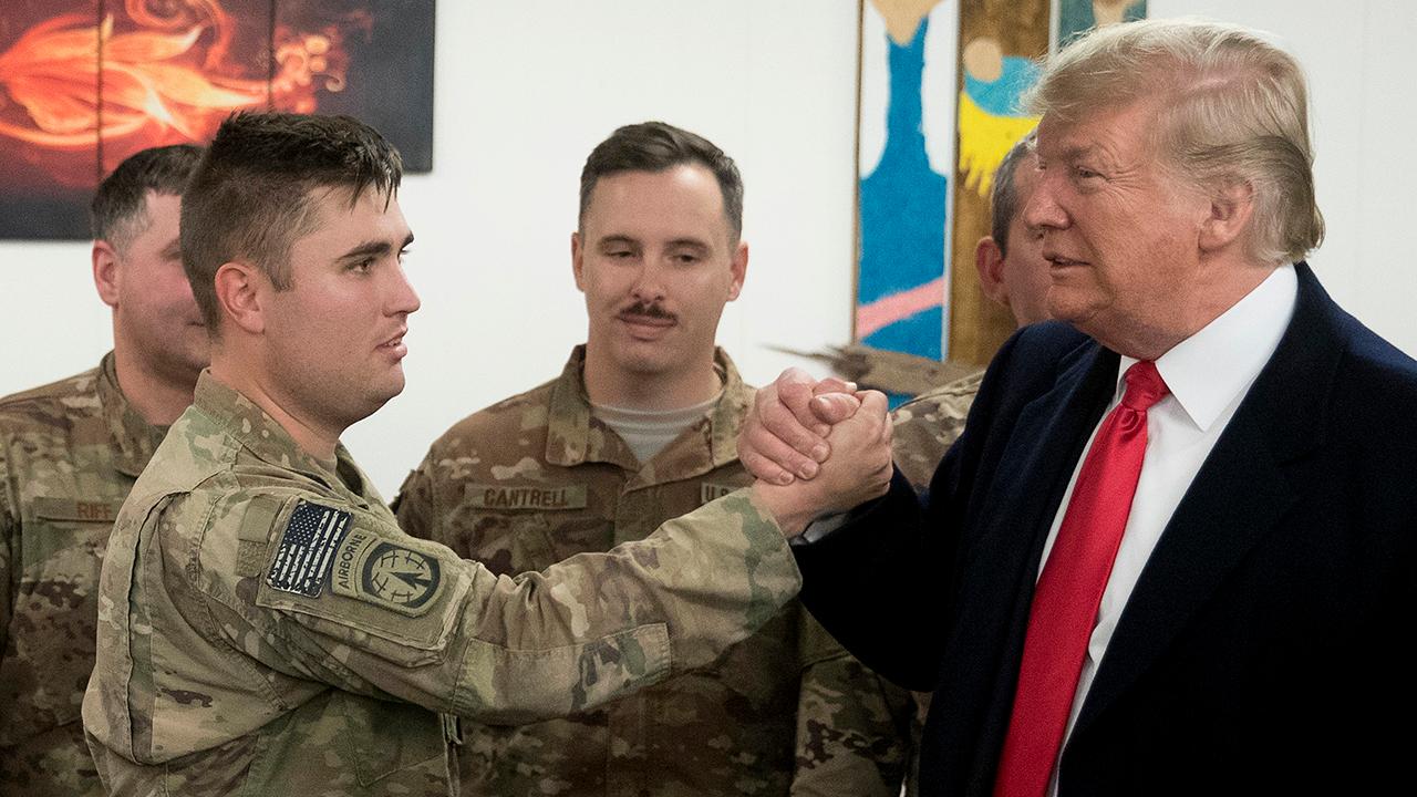 Trump makes first combat zone visit since taking office, defends decision to pull troops from Syria during trip to Iraq