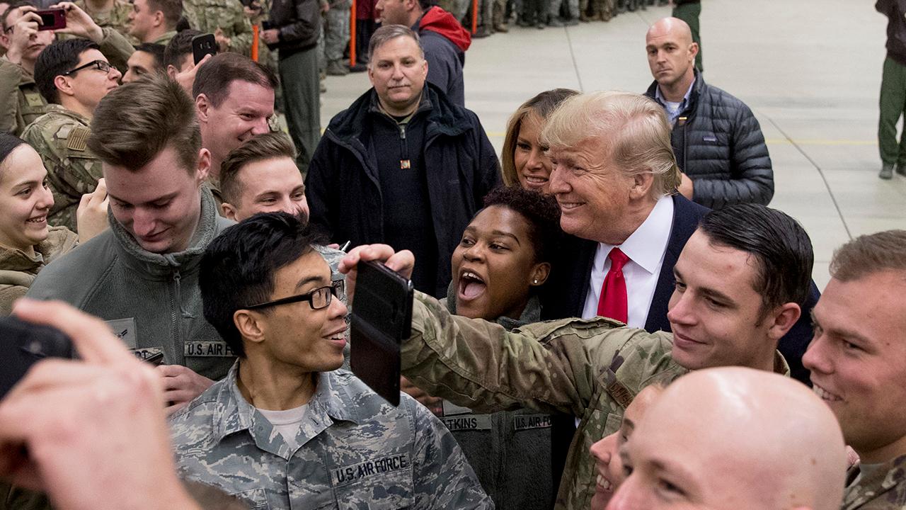 President Trump greets US troops stationed at Ramstein Air Base in Germany