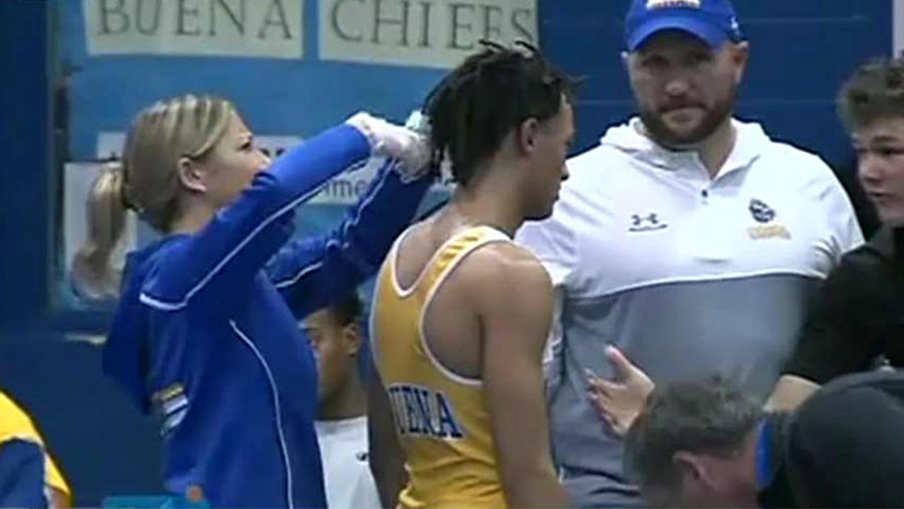 New Jersey referee banned from officiating matches after making teen wrestler cut his dreadlocks