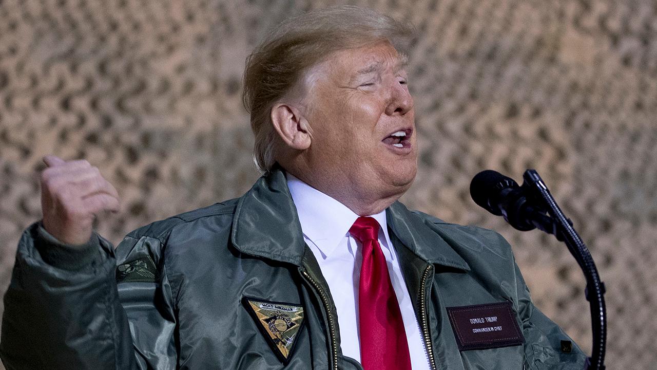 Lawmakers in Iraq condemn Trump, demand US forces leave country after the president's visit to troops