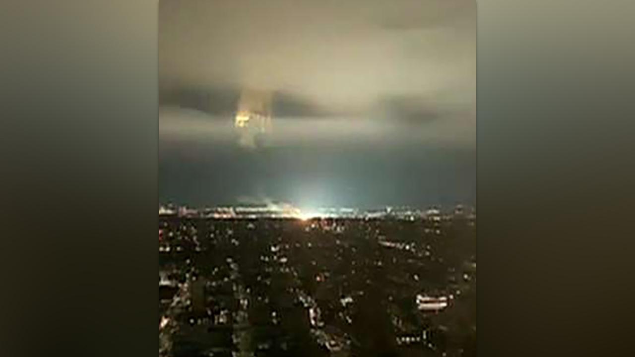 Blinding blue light sparks panic in New York City after transformer explosion illuminates night sky