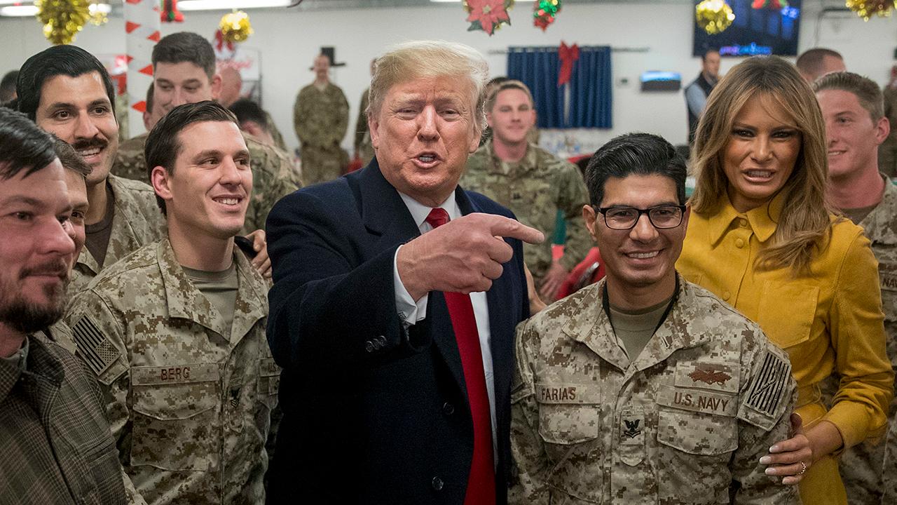 President Trump's unannounced visit with troops at Al Asad Airbase has angered some members of the Iraqi Parliament