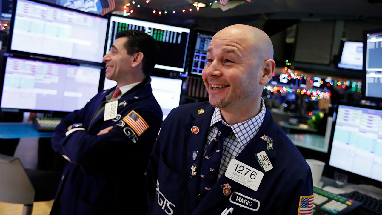 What do wild swings on Wall Street indicate about the economic outlook for 2019?