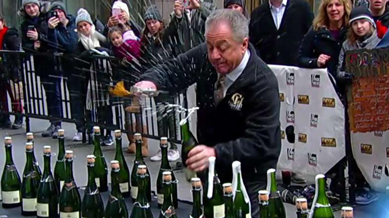 Bottle popper! Butch Yamali looks to break the world champagne sabering record of 66 bottles in 60 seconds