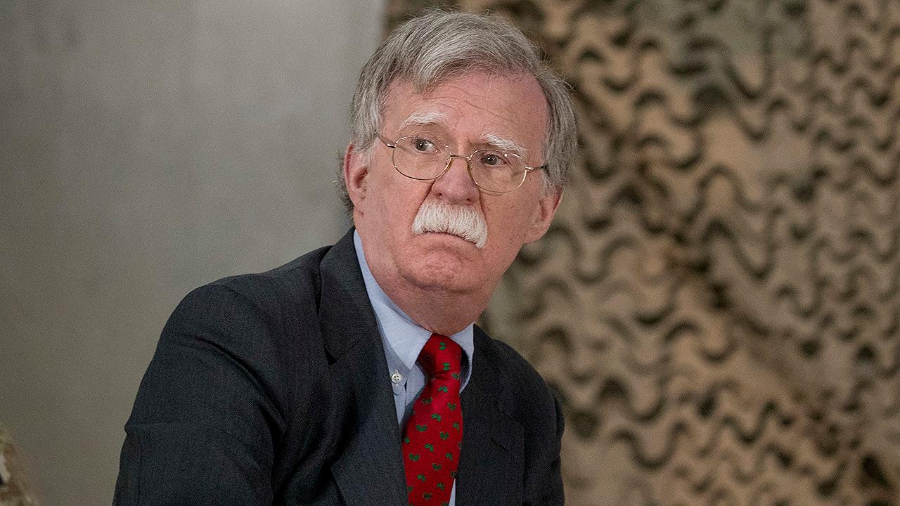 Bolton says US troops won't leave Syria until ISIS is defeated and Turkey guarantees it won't strike the Kurds