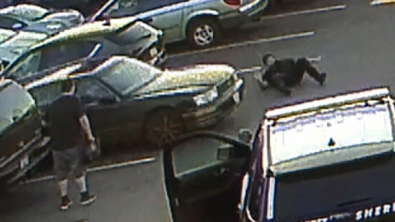 Surveillance video shows teen suspect ram her car into police officer in Washington