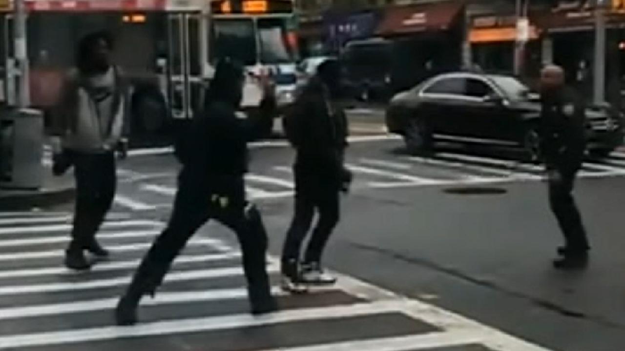 NYPD officers beat men with batons during violent altercation caught on camera