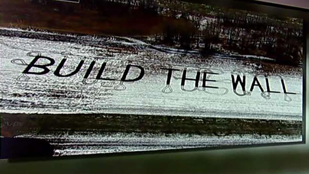 North Dakota farmer writes 'build the wall' in his fields