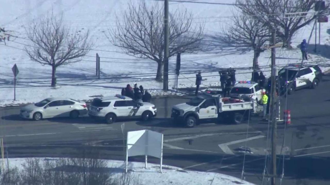 Police respond to hostage situation at UPS facility in Logan Township, New Jersey following reports of active shooter