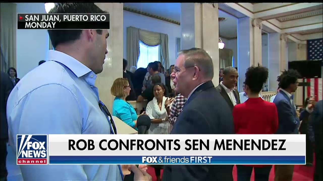 Rob Schmitt Confronts Sen. Menendez During Dems' Puerto Rico Retreat