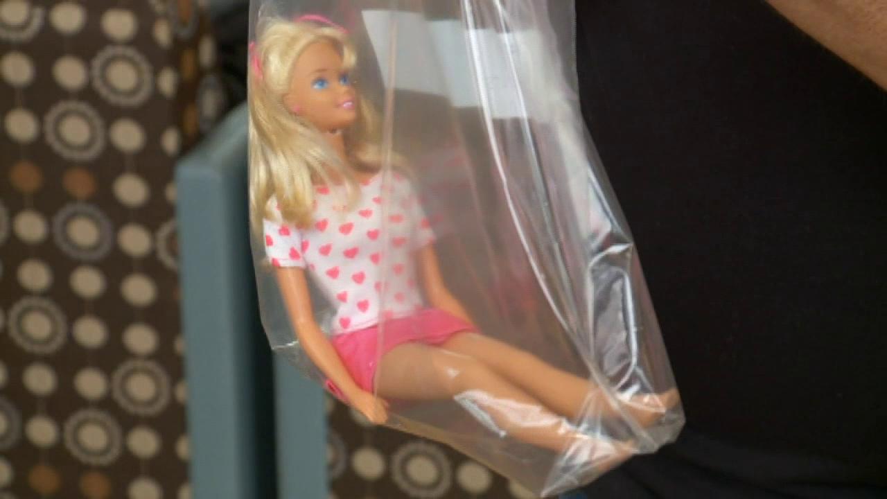 Barbie doll left at six-year-old's grave may provide clues needed to identify killer