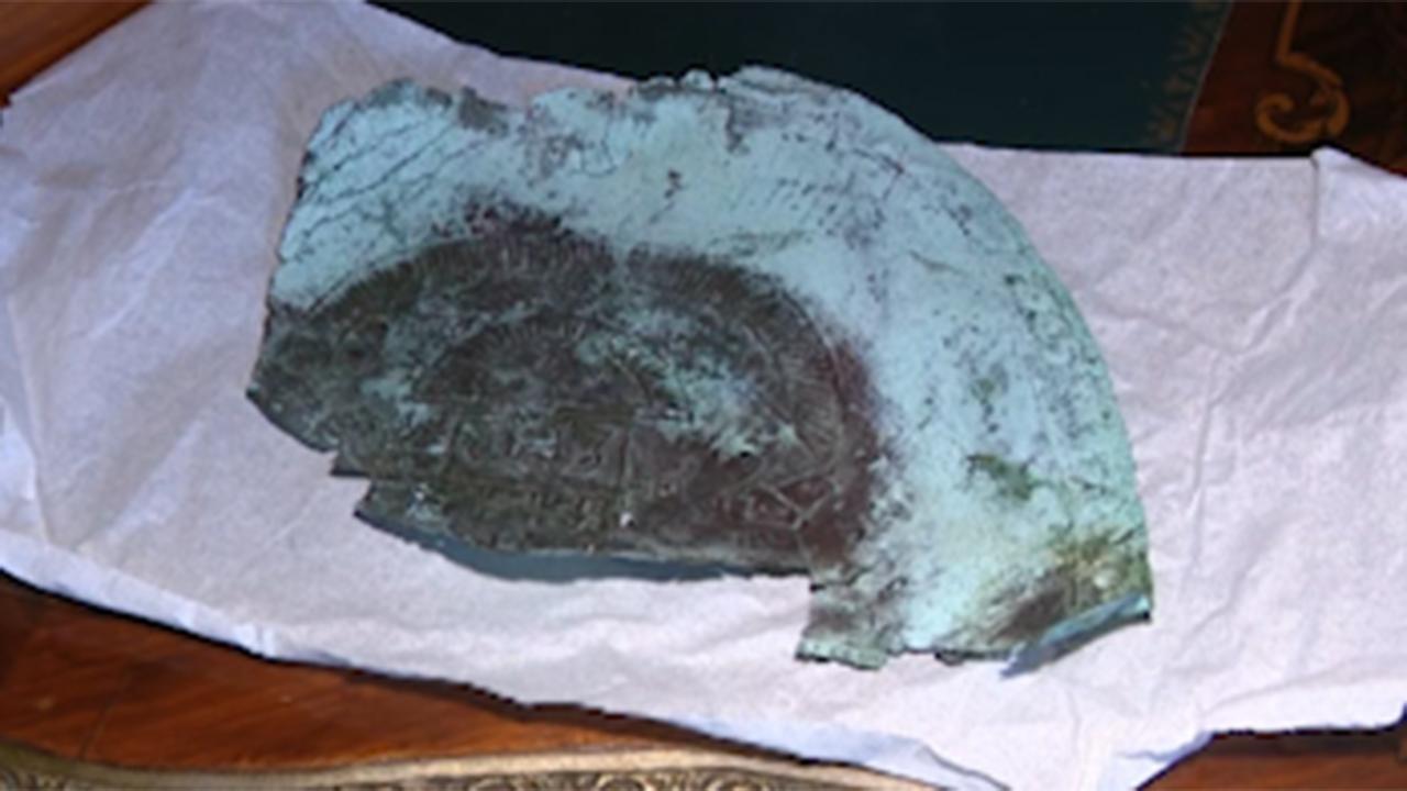 Thousand year old mask fragment containing rare space metal washes ashore on a Florida beach