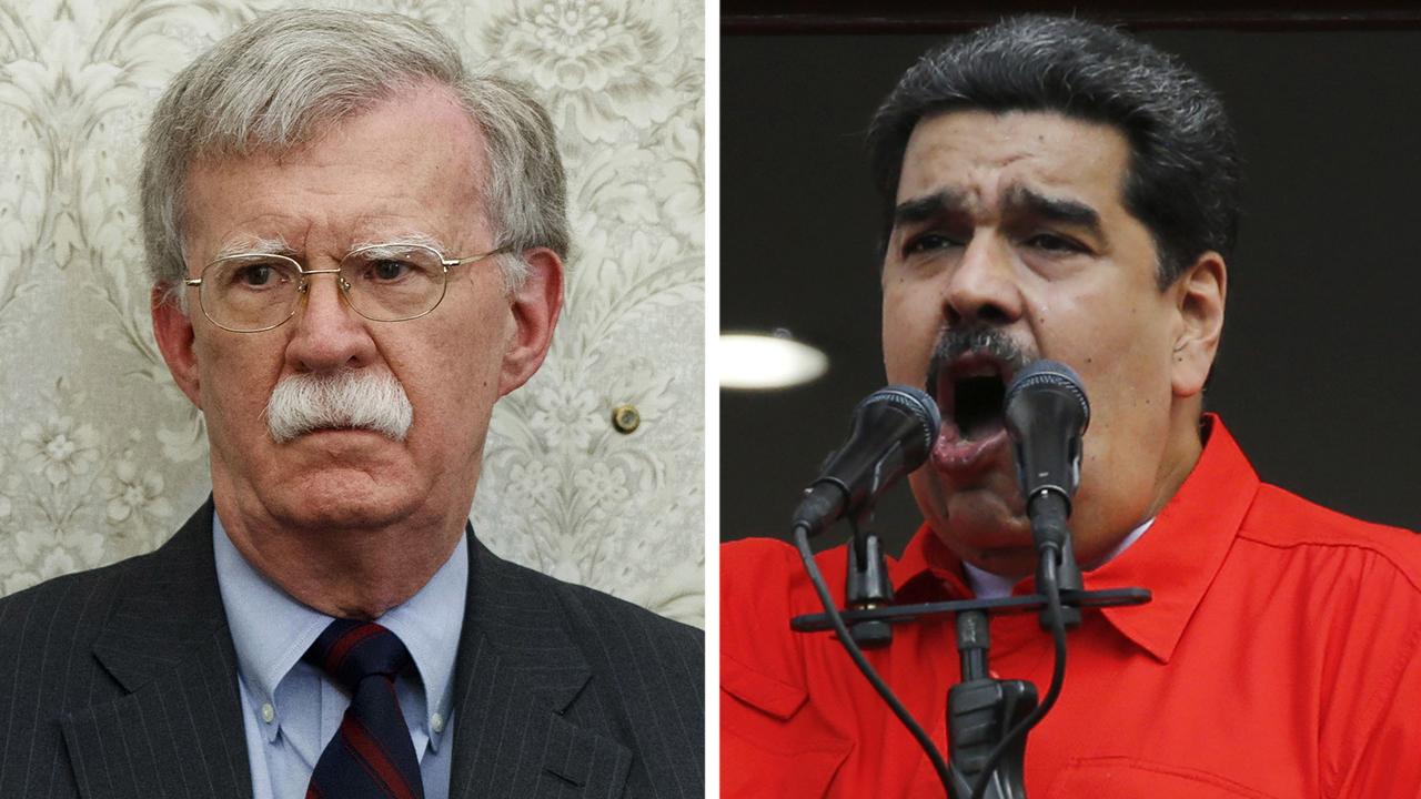 Bolton warns Venezuela's Maduro to stay away from Americans as crisis deepens