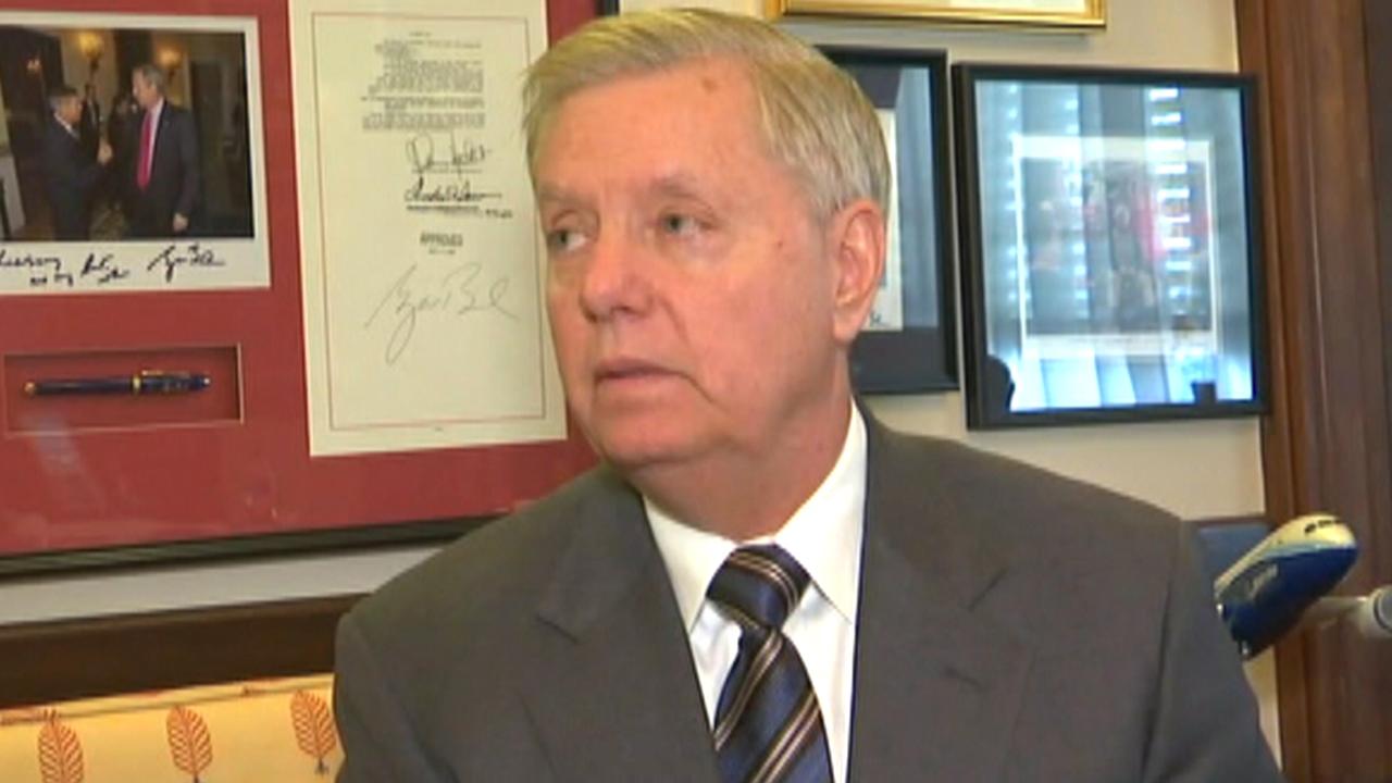 Sen. Lindsey Graham reacts to President Trump's announcement of a deal to reopen the government