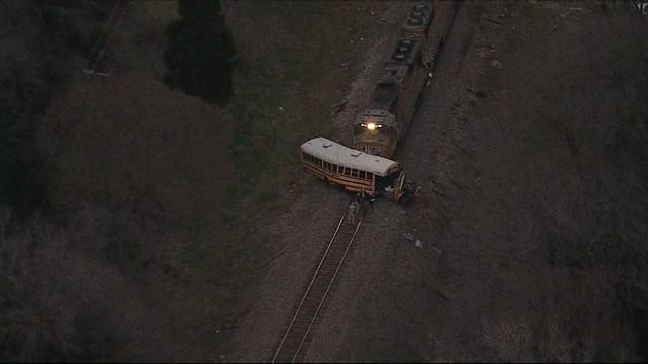 Freight train slams into school bus killing student and injuring others