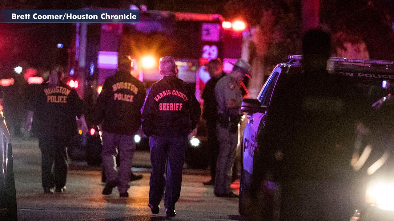 Two Houston police officers in critical condition after being shot while serving search warrant