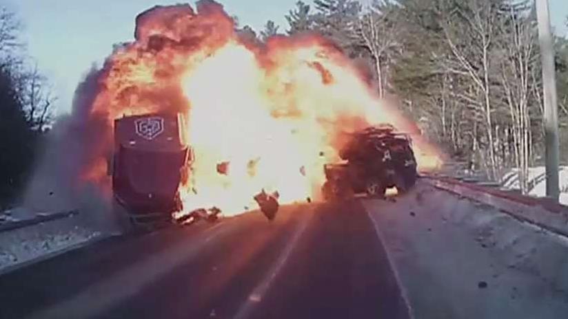 Father and son rescue driver from burning car following crash with a semi-truck