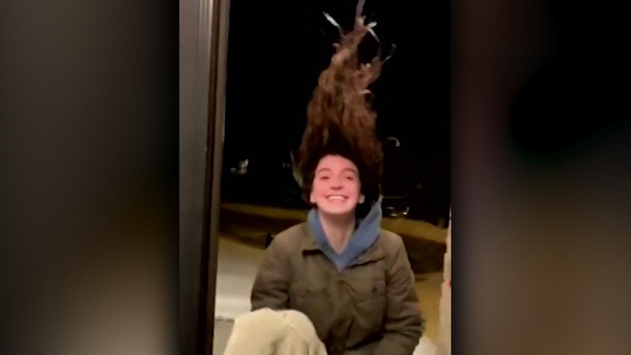 Frigid temperature from polar vortex freezes woman's hair in place