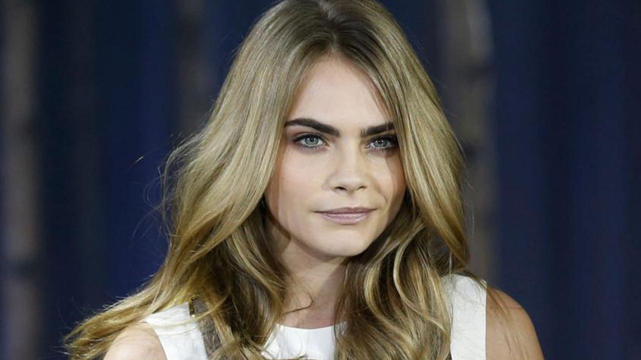Cara Delevingne recreates Janet Jackson's 'iconic' topless cover in new fashion campaign