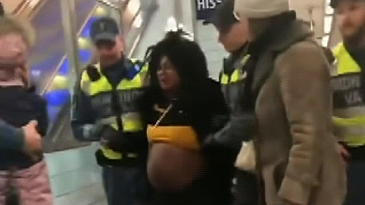 Raw video: Visibly pregnant woman physically removed from Stockholm metro