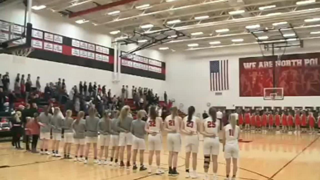  Iowa crowd sings national anthem at high school basketball game 
