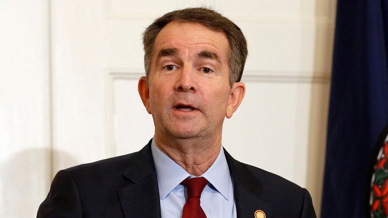 Virginia Gov. Northam says he will not resign, is neither person in racist yearbook photo