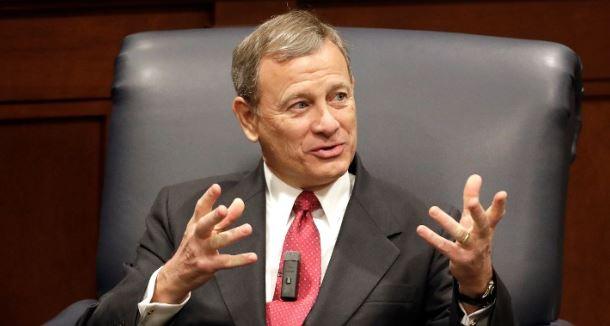 Chief Justice John Roberts joined the Supreme Court's liberal wing in temporarily blocking a Louisiana abortion law