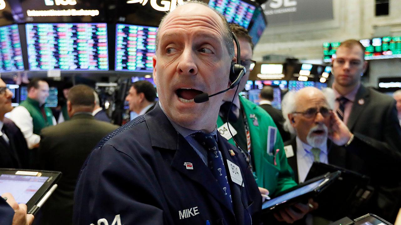 Dow closes higher for the seventh-straight week