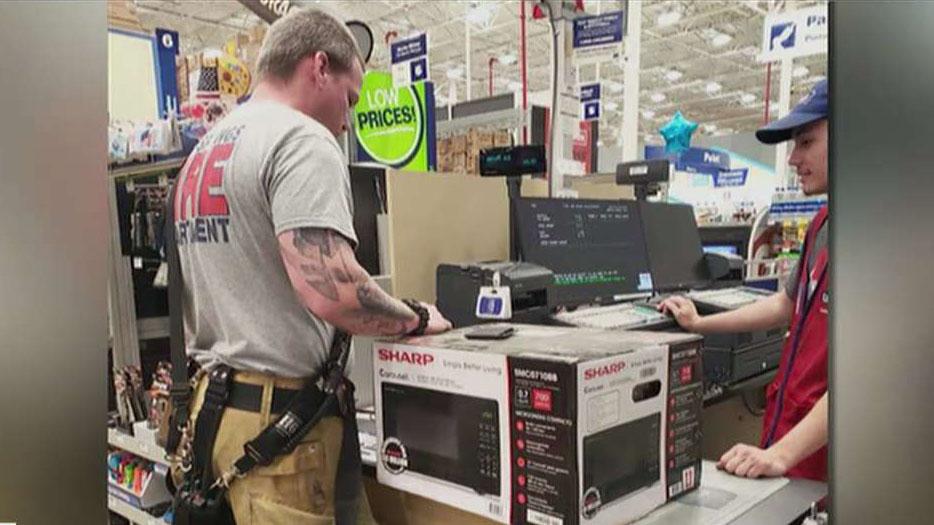 Firefighters buy an elderly woman a microwave so she can heat up her frozen meals