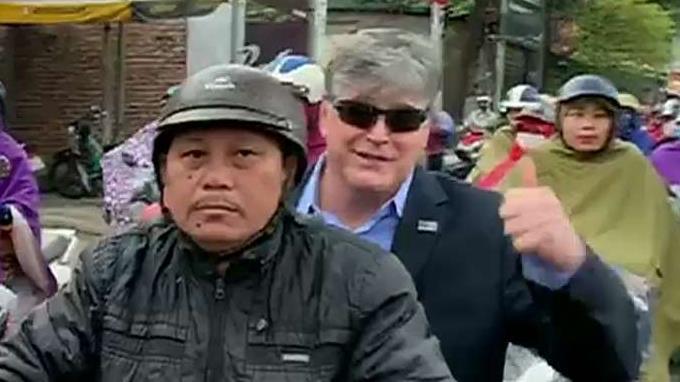 Sean Hannity commutes to set via scooter in Vietnam