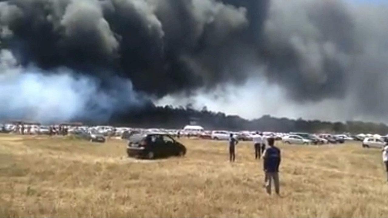 Parking lot fire burns over 200 cars
