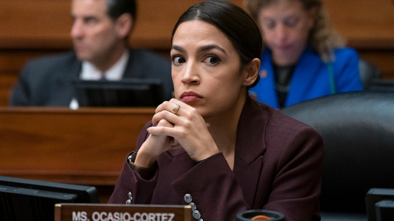 Alexandria Ocasio-Cortez questions Cohen on whether or not Trump devalued assets to evade taxes