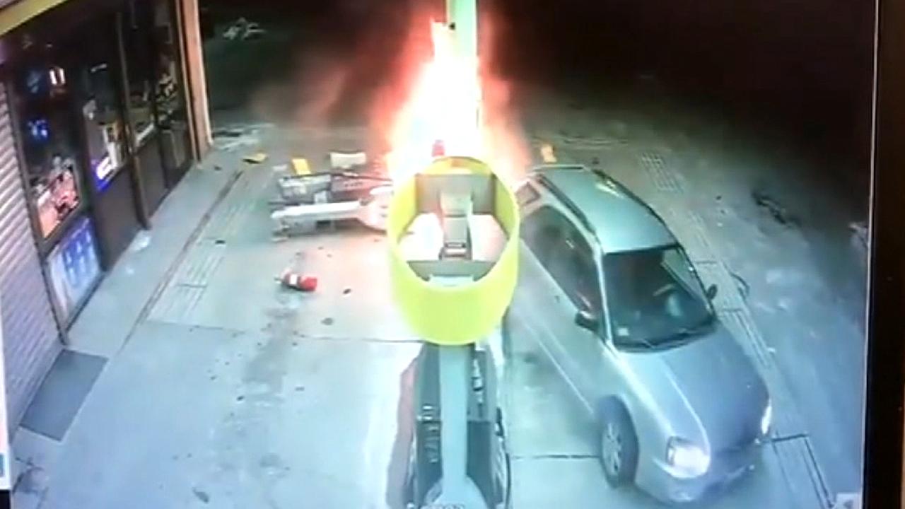 Driver starts fire at gas station after backing up into pump