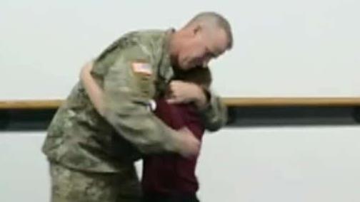 Father deployed with the Army National Guard returns to surprise his son at taekwondo class