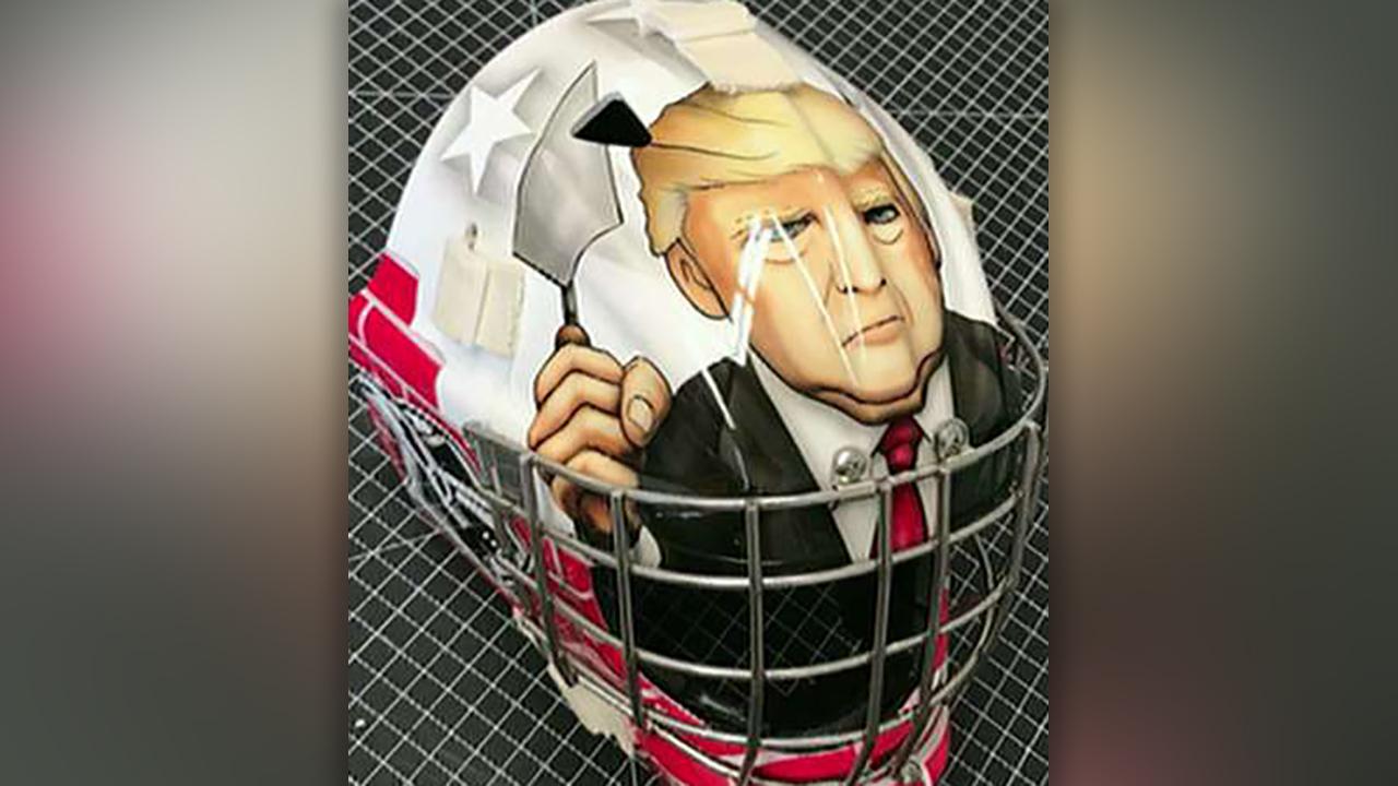 Youth hockey mask features President Trump building a wall