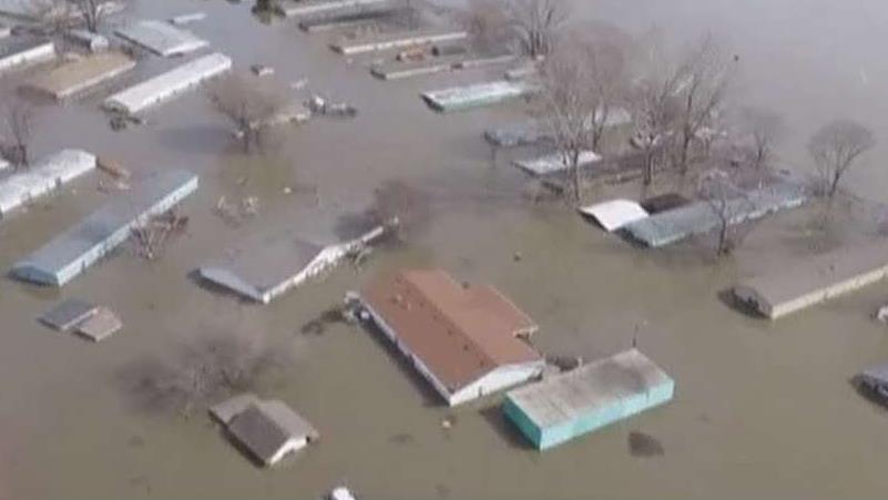 Floodwaters break through levees in Nebraska, Iowa and Missouri