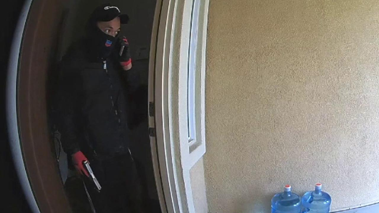 Home surveillance camera captures two men stealing from a California home