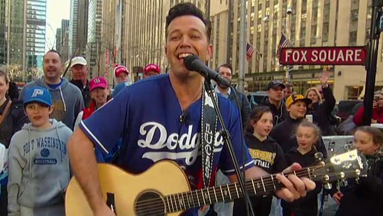 Lucas Hoge performs 'Take Me Out to the Ball Game' to kick off MLB opening day