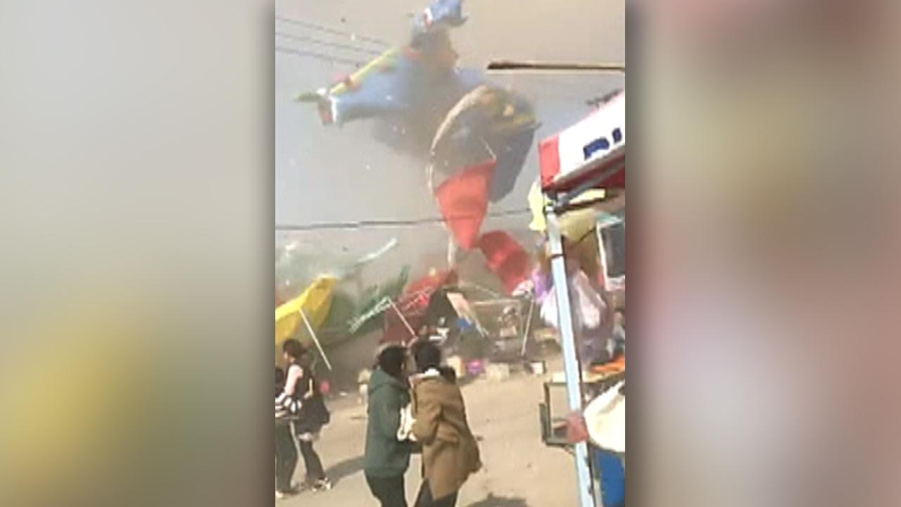 Two children killed after dust devil launches bounce house into air in China
