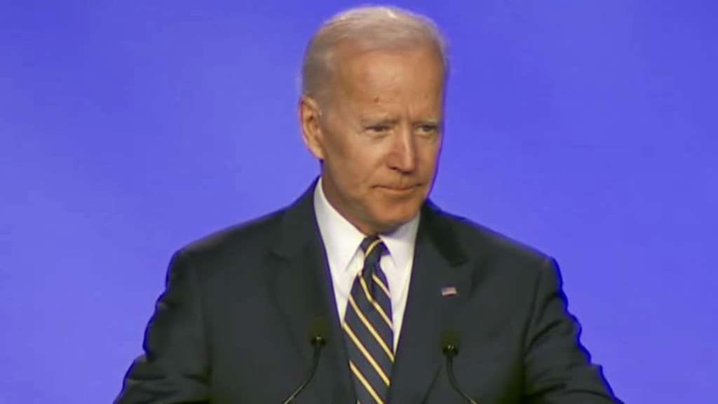 Joe Biden makes hugging joke at first public appearance since allegations of inappropriate conduct