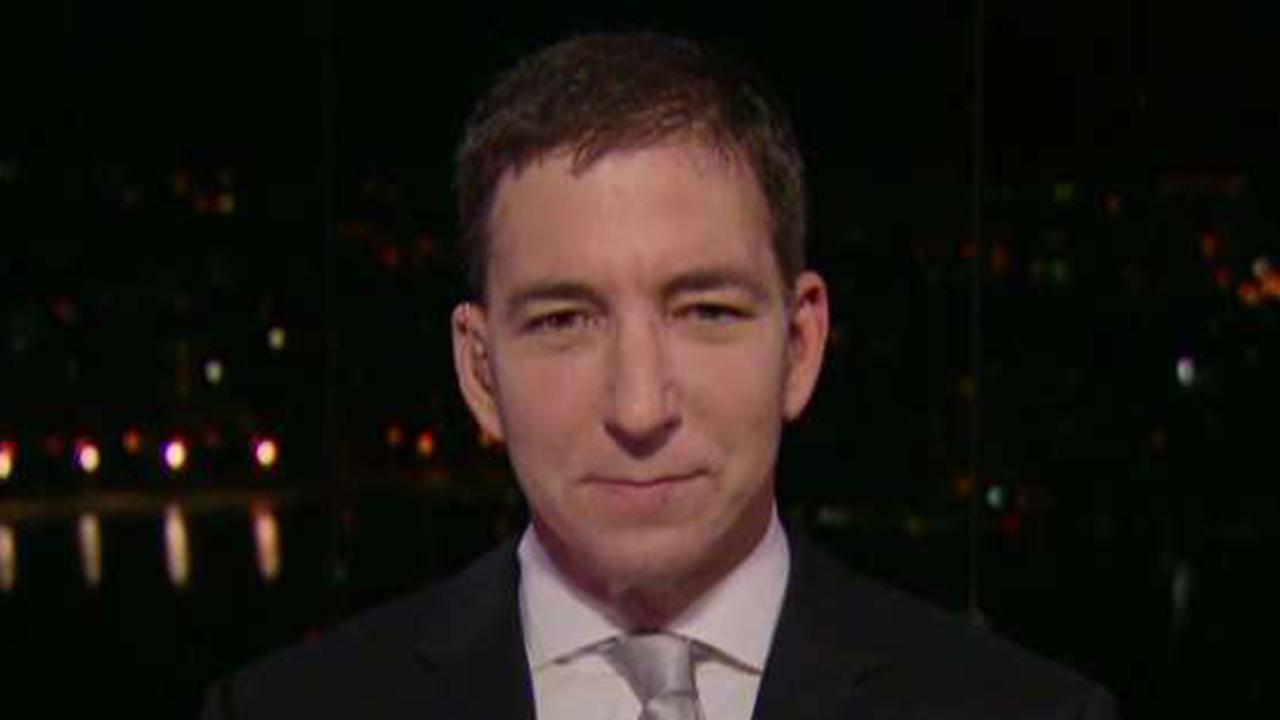 Greenwald: Media spent years drowning US in conspiracy theories