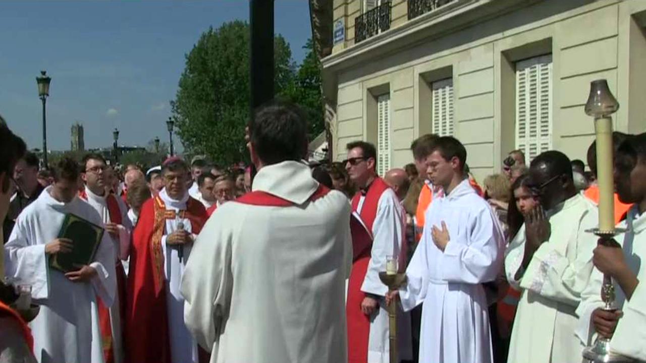 Way of the Cross ritual takes place around Notre Dame Cathedral
