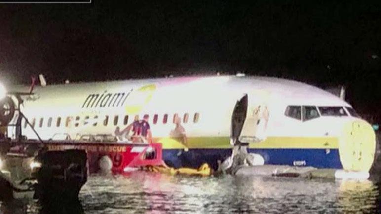 Boeing 737 slides off runway and into river in Jacksonville, Florida
