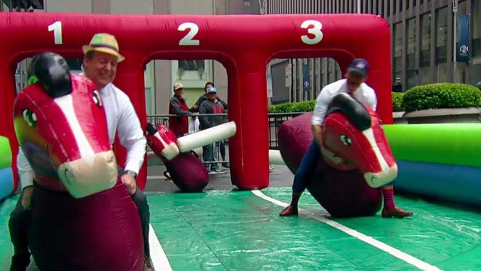 Pete and Ed compete in a derby on the Fox Square
