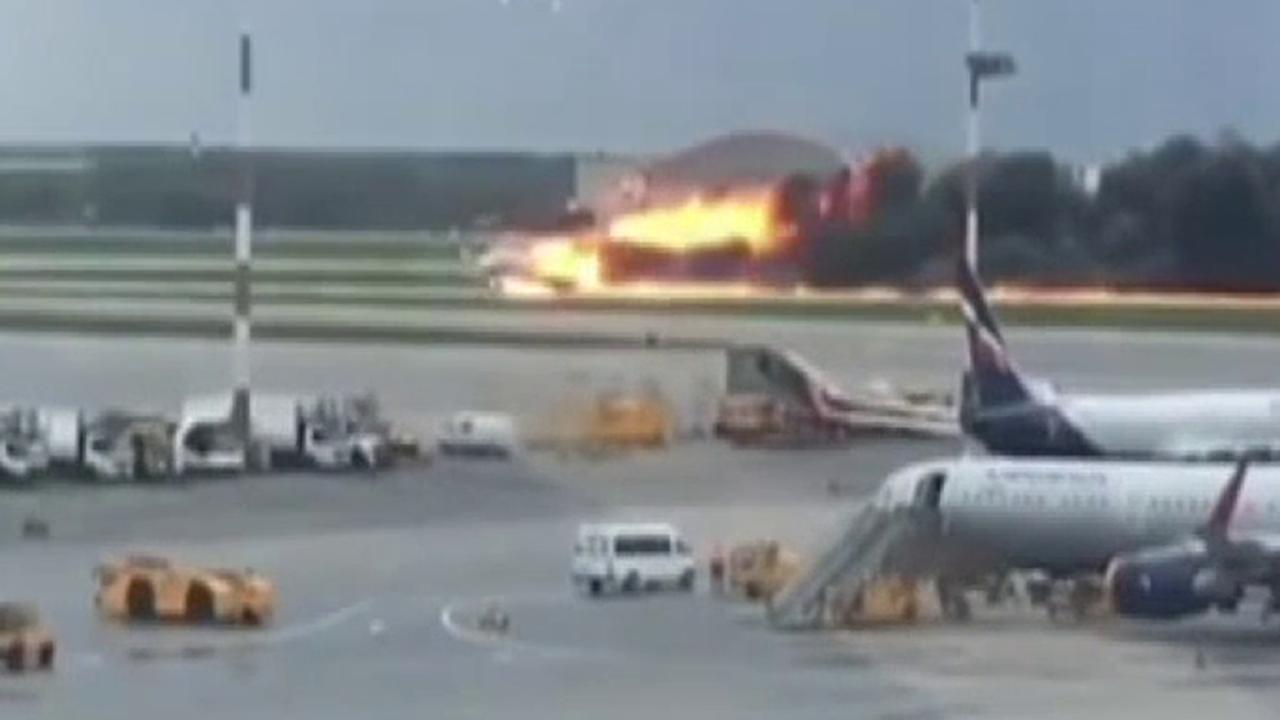 Officials and passengers react to Moscow plane fire