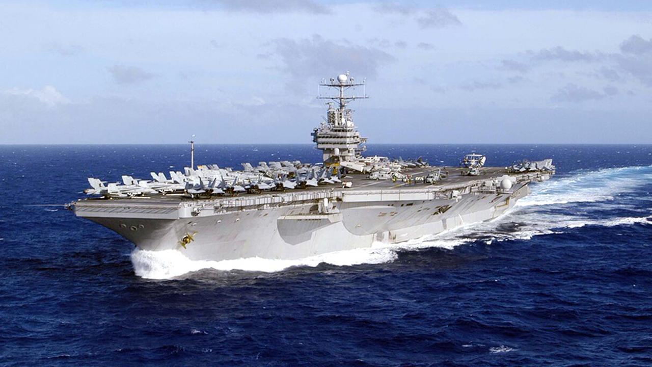 US deploys strike group to send 'clear and unmistakable' message to Iran